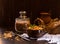 Vegetarian pilaf of spelt with vegetables on a wooden kitchen table, dark background with space