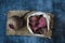 Vegetarian pile of healthy beet chips Purple Baked Beet Chips Vegan snacks, vegetable chips in canvas bag and ceramic bowl, rustic