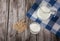 Vegetarian pine nut milk in a glass cup and jug on wooden background. Topview