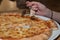 Vegetarian pizza is eaten - detail