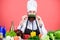 Vegetarian recipe concept. Choose vegetarian lifestyle. Man cook hat apron hold fresh vegetables. Vegetarian restaurant