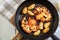 Vegetarian roasted cauliflower steak with herbsand fried potatoes