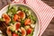 Vegetarian salad with rucola, figs, blue cheese, strawberries, grapes, Autumn salad. Long banner format, top view