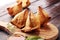 Vegetarian samsa or samosas.Indian special traditional street food punjabi samosa or Coxinha, Croquete and other Fried Brazilian