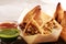 Vegetarian samsa or samosas.Indian special traditional street food punjabi samosa or Coxinha, Croquete and other Fried Brazilian