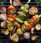 Vegetarian skewers, grilled vegetable skewers of zucchini, peppers and potatoes with the addition of aromatic herbs and olive oil