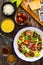 Vegetarian style caesar salad on wooden background