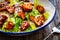 Vegetarian style caesar salad on wooden background