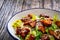 Vegetarian style caesar salad on wooden background