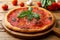 vegetarian tomato pizza marinara on chopping board