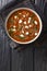 Vegetarian traditional Greek soup with lentils served close-up in a plate. Vertical top view