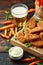 Vegetarian vegan southern style crispy nuggets served with sweet potato chips and beer