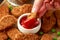 Vegetarian vegan southern style crispy nuggets served with sweet potato chips and beer