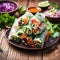 Vegetarian vietnamese spring rolls with spicy sauce, carrot, cucumber, red cabbage and rice noodl