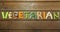 Vegetarian  word on wood background