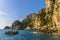 Vegetated sandstone cliffs and sea stacks along the east coast of the Island of Capri, Italy