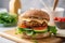 Veggie burger, with a homemade patty made of chickpeas, lentils, and vegetables with avocado, lettuce, tomato, and