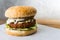 Veggie burger on wooden table gray background