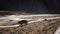 A Vehicle on the Ladakh Highway in the Mountains