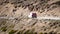 A Vehicle on the Ladakh Highway in the Mountains