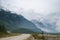 Vehicle moving on winding scenic Icefields parkway