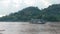 vehicle and people on car ferry crossing mekong river at xiangman port luangprabang district northern of lao