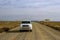 Vehicle pick-up in the desert.