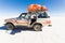 Vehicle SUV Salar De Uyuni desert plateau drive journey.