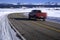 Vehicle Truck or Car Driving on Road Turn Winter Weather with Teton Mountains