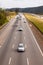 Vehicles on BR-374 highway with headlights on during the daylight obeying the new Brazilian transit laws