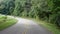 Vehicles cruising through the appalachians in the summertime