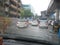 Vehicles drive on flooded Mumbai Road