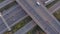 Vehicles Driving on a Motorway at Sunset Using Bridge Infrastructure