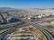 Vehicles elevating one of the most complex roads in Athens, the famous road junction at Faliro, Piraeus. Aerial view over Attica