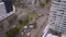 Vehicles and people circulating at the intersection of Amazonas and United Nations avenues during a cloudy day