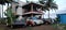 Vehicles standing in front of farmhouse in the eve of Deepavali