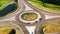 Vehicles Travel In Roundabout in Realtime White Car Leads From Bottom