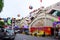 Vehicles traveling on a street beside Xuan market in Hanoi capital. Xuan market in mid autumn festival