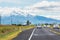 Vehicles travelling along State Highway One on the North Island entering the Ruapehu district with view of the land mark volcanic