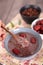 VEight treasures of health porridge in the dining tray and jujubes and raisins in the other two bowls