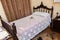 Vejer de la Frontera, CÃ¡diz, Spain - June 14, 2021: Old typical bed of the bedrooms of the Andalusian villages in Vejer de la