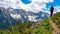 Velika Baba  - A hiking man with backpack on a hiking trail in the rocky sharp Kamnik Savinja Alps in Carinthia, Austria, Slovenia