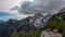 Velika Baba  - A hiking woman with helmet on a hiking trail in Kamnik Savinja Alps in Carinthia, Austria, Slovenia. Bad weather