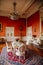 Velke Brezno, Czech Republic, 26 June 2021: Neo-Renaissance chateau Velke Brezno, castle interior, baroque furniture, red dining