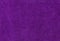 Velour or velvet fabric background, texture. Purple color, high
