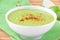 Velvety cream soup from a gentle green peas with paprika