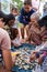 Vendor sell freshly caught small fish from river