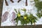 Vendor selling fresh flowers, vegetables, fruits, umbrella for devotees to bless Hindu god Ganesh at local market on the first day