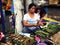 A vendor sells Tupig, a local delicacy made from glutenous rice