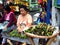 A vendor sells Tupig, a local delicacy made from glutenous rice